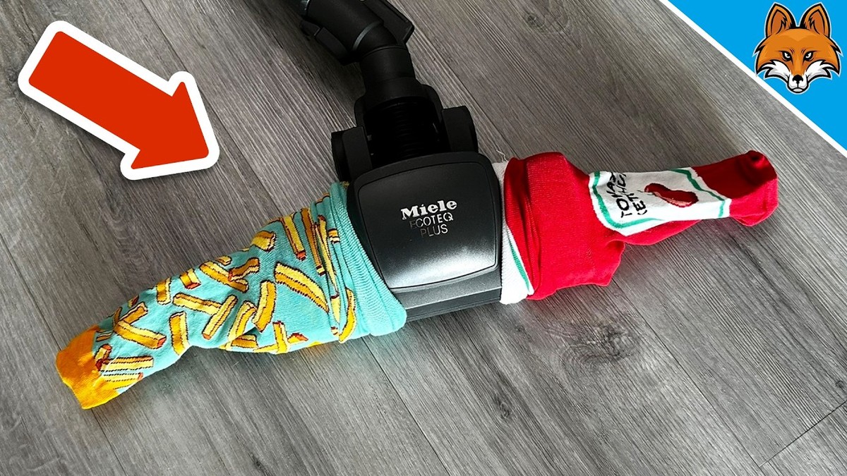 Starý ponožka jako filtr do vysavače: trik, který prodlouží jeho život